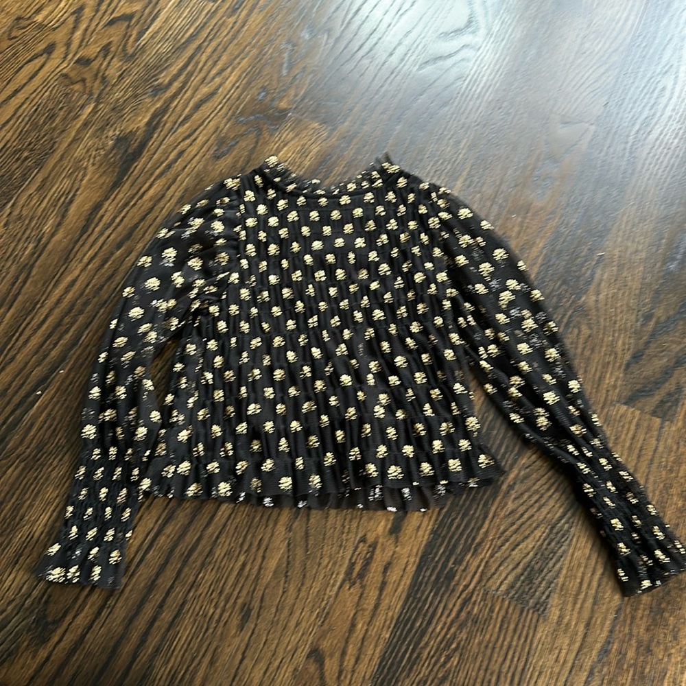 Zara little girls top. Black and gold with see through sleeves and gold print.